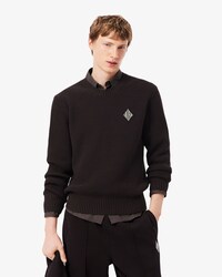Maglione con coste perlate e stemma