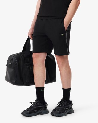 Shorts in tessuto felpato con striscia con logo regular fit