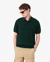 Maglione fluido in maglia a coste con collo a polo