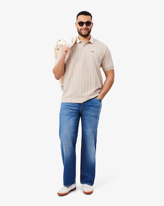 Polo dal taglio classico in jacquard con monogramma