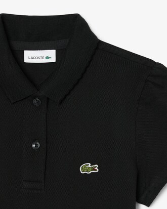 Polo in piqu&eacute; con collo smerlato