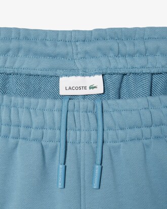 Pantaloni in tessuto felpato con logo goffrato