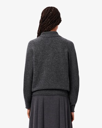 Maglione a collo alto in lana cardata