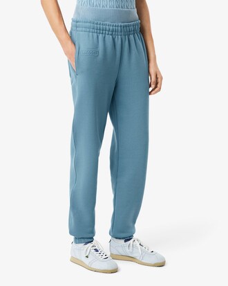 Pantaloni in tessuto felpato con logo goffrato