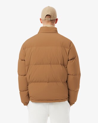 Piumino con cappuccio impermeabile