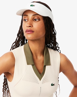 Polo da tennis smanicata in maglia elasticizzata