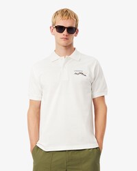 Polo in mini-piqu&eacute; con motivo ricamato classic fit