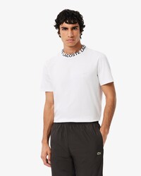 T-shirt in piqu&eacute; con marchio jacquard
