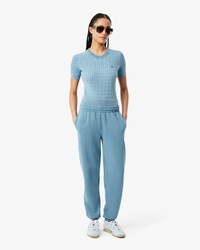 Pantaloni in tessuto felpato con logo goffrato