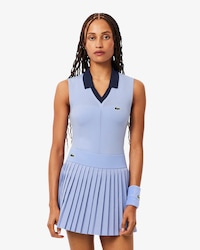 Polo da tennis smanicata in maglia elasticizzata