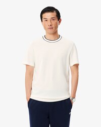 T-shirt in piqu&eacute; elasticizzato con colletto a righe