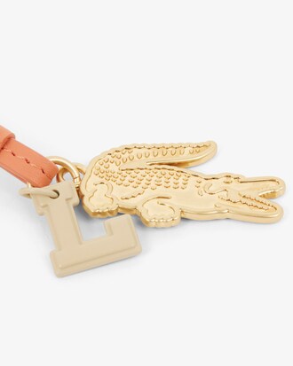 Portachiavi con charm, L, specchio e racchetta da tennis