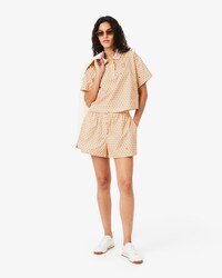 Polo oversize con stampa tennis