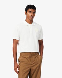 Polo da golf in mini piqu&eacute; elasticizzato con stemma