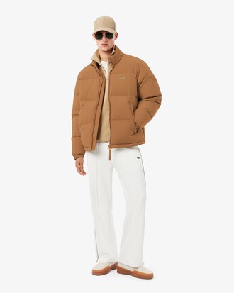 Piumino con cappuccio impermeabile