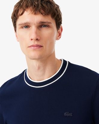 T-shirt in piqu&eacute; elasticizzato con colletto a righe