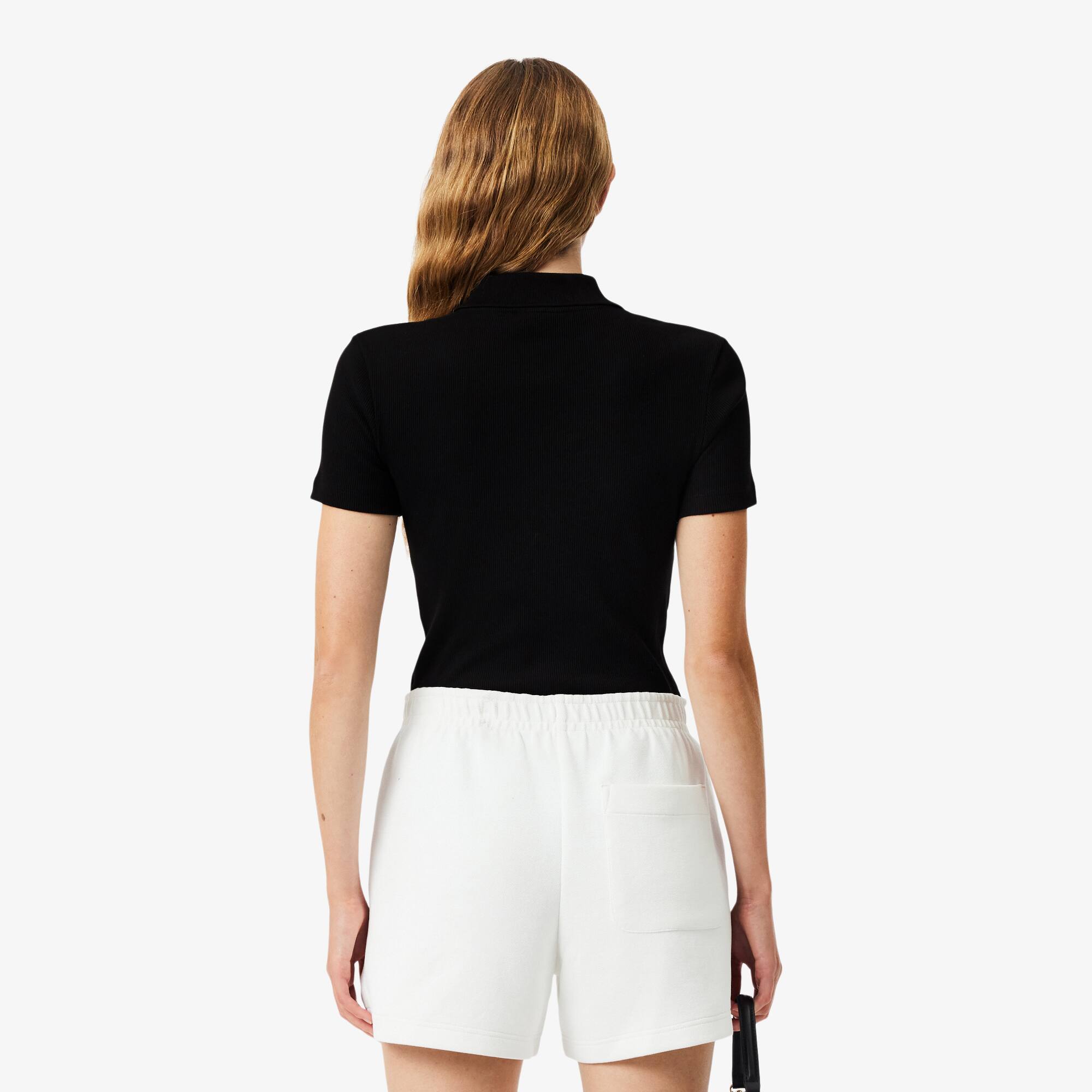 Thumbnail - Lacoste Slim Fit-Polohemd L.12.D aus gerippter Baumwolle - Schwarz Size 40