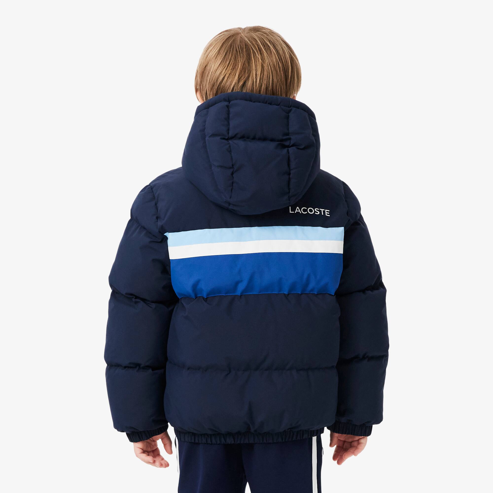 Thumbnail - Lacoste Daunenjacke mit Kapuze und Colorblock-Design - Navy Blau Size 10 - 12A