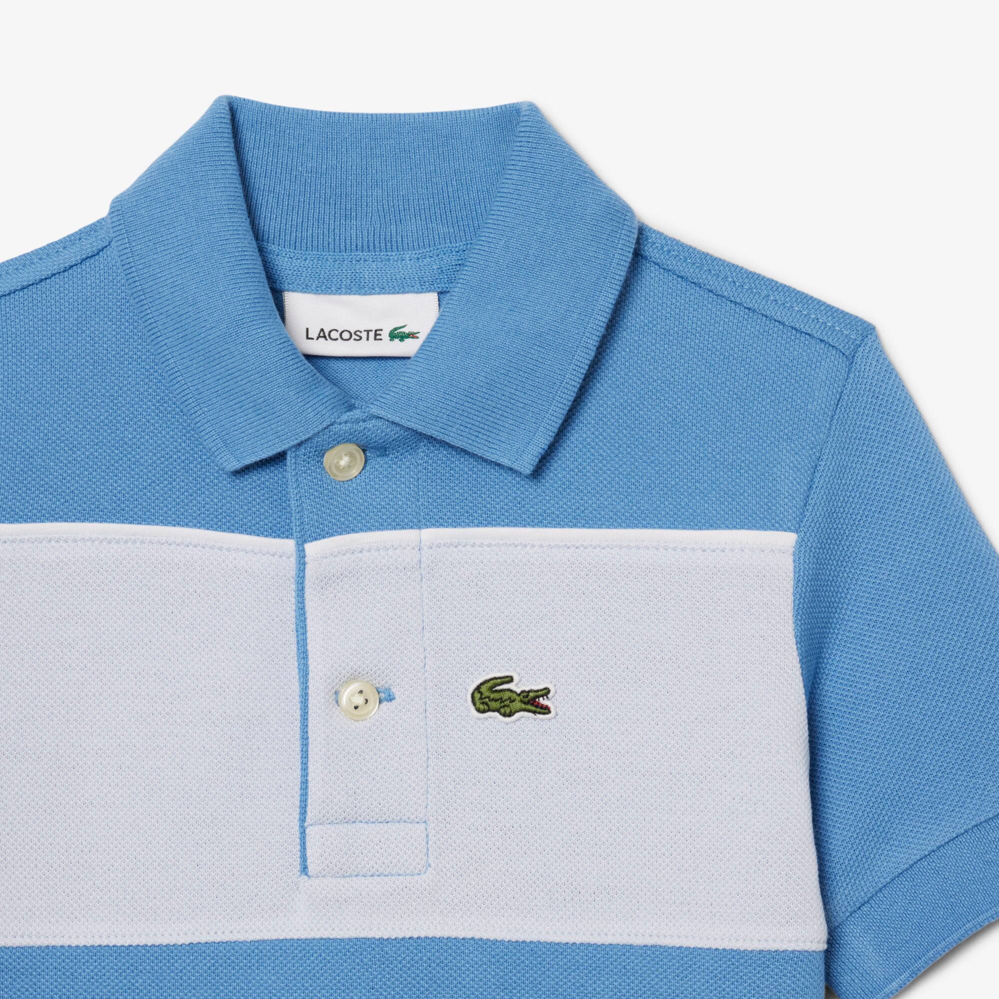 Thumbnail - Lacoste Polohemd aus Petit Piqué mit Colorblock-Design - Blau Size 3 - 3A