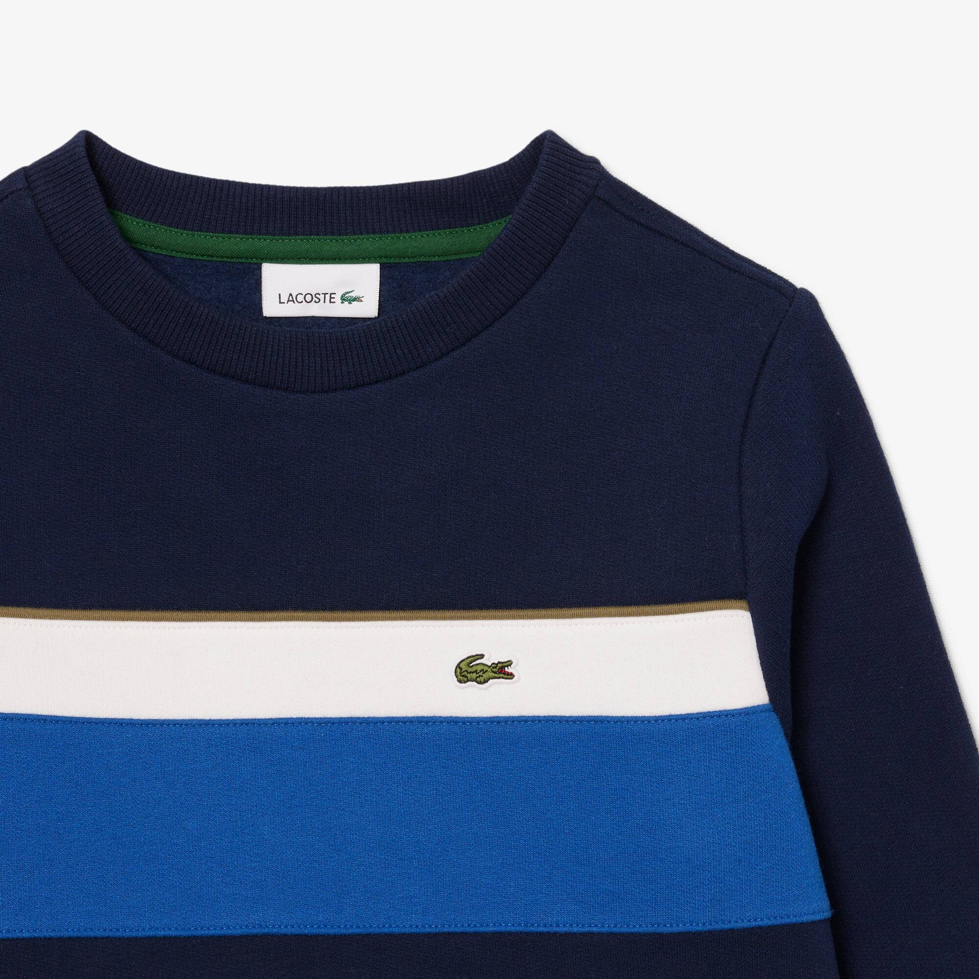 Thumbnail - Lacoste Fleece-Sweatshirt mit Colorblock-Design - Navy Blau / Khaki Grün / Weiß / Blau Size 12 - 16A