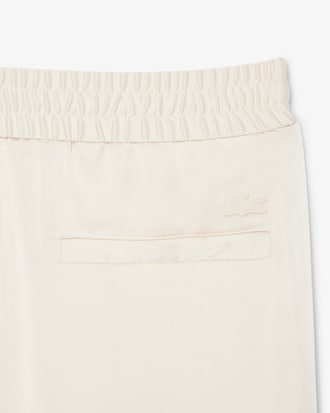 Fließende Hose mit Reißverschlusstaschen