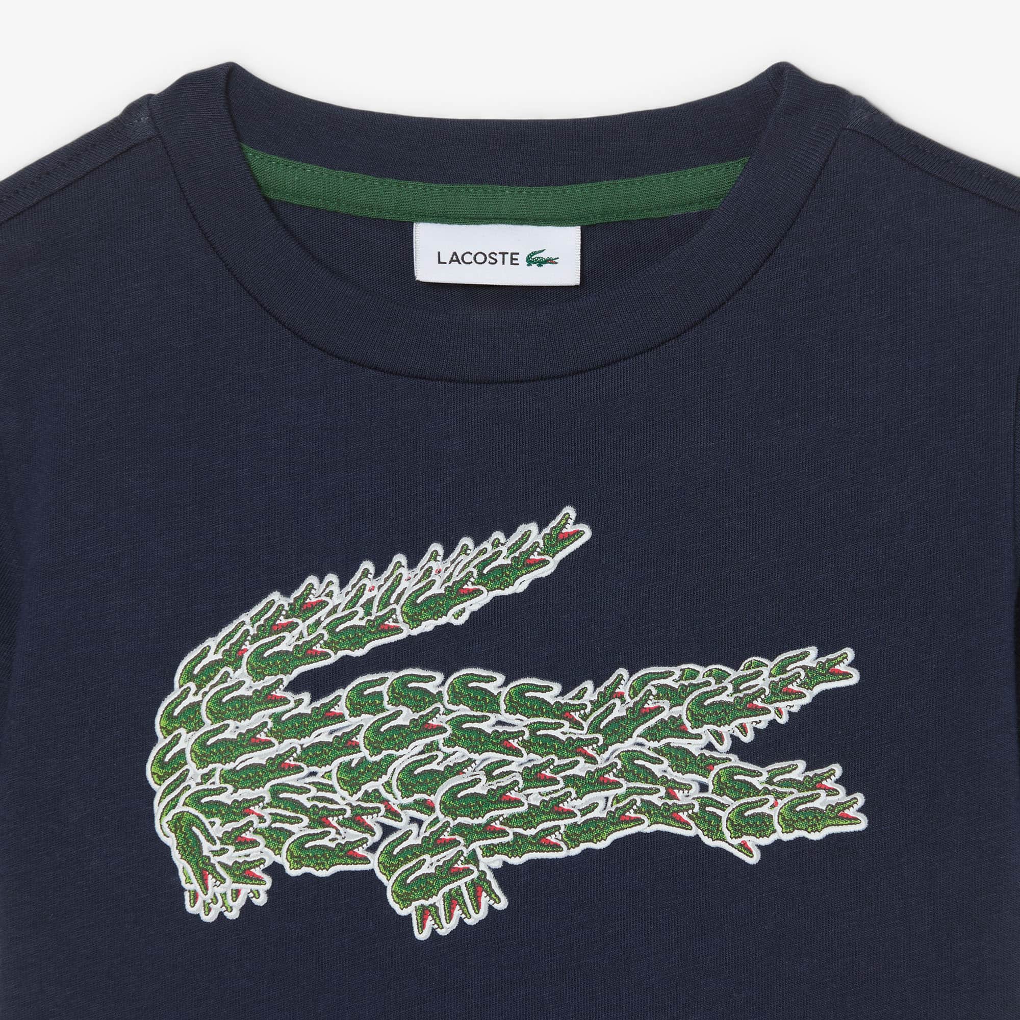 Thumbnail - Lacoste T-Shirt aus Baumwolle mit Krokodil-Print - Navy Blau Size 7 - 7A