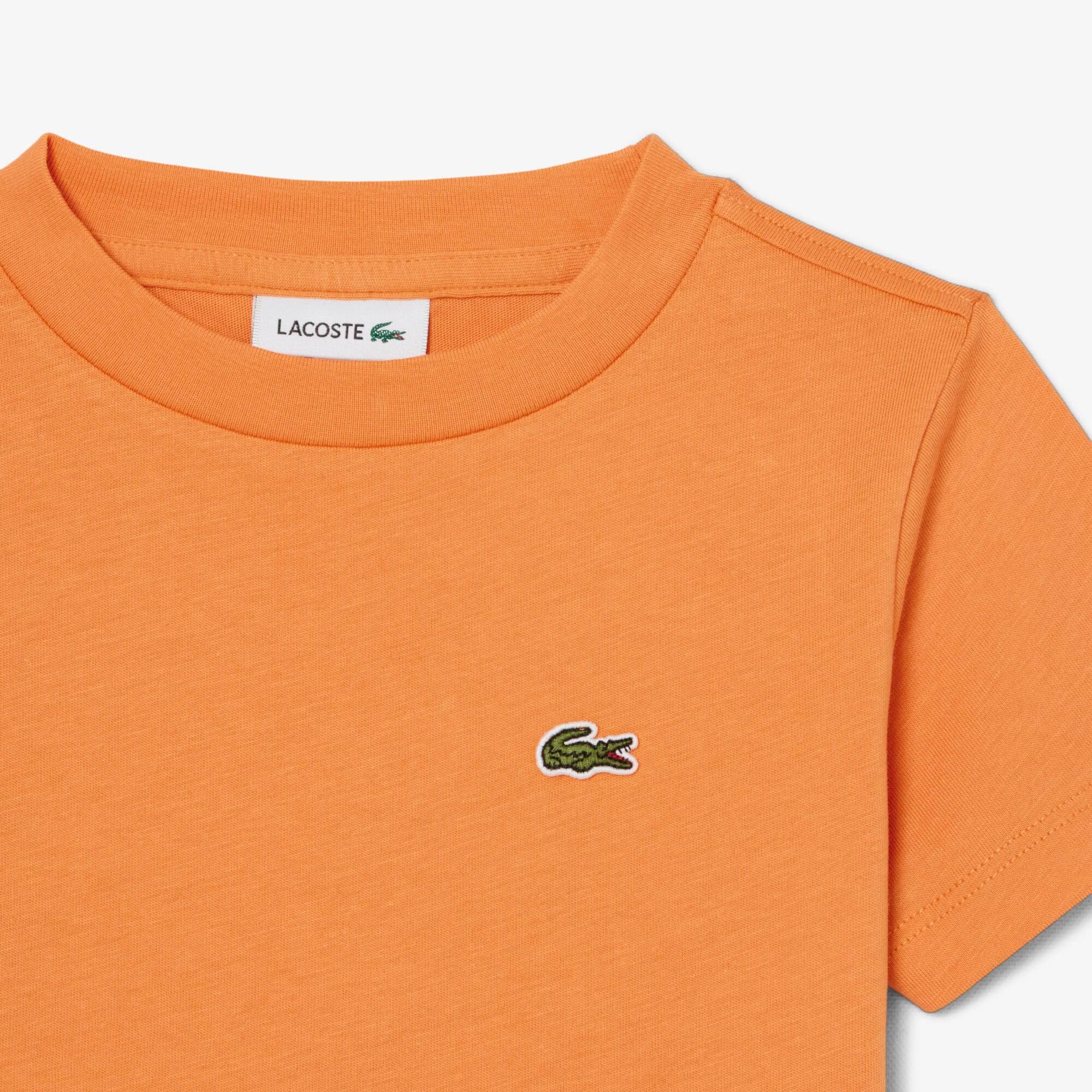 Thumbnail - Lacoste Unisex T-Shirt aus Baumwolle - Orange Size 5 - 5A