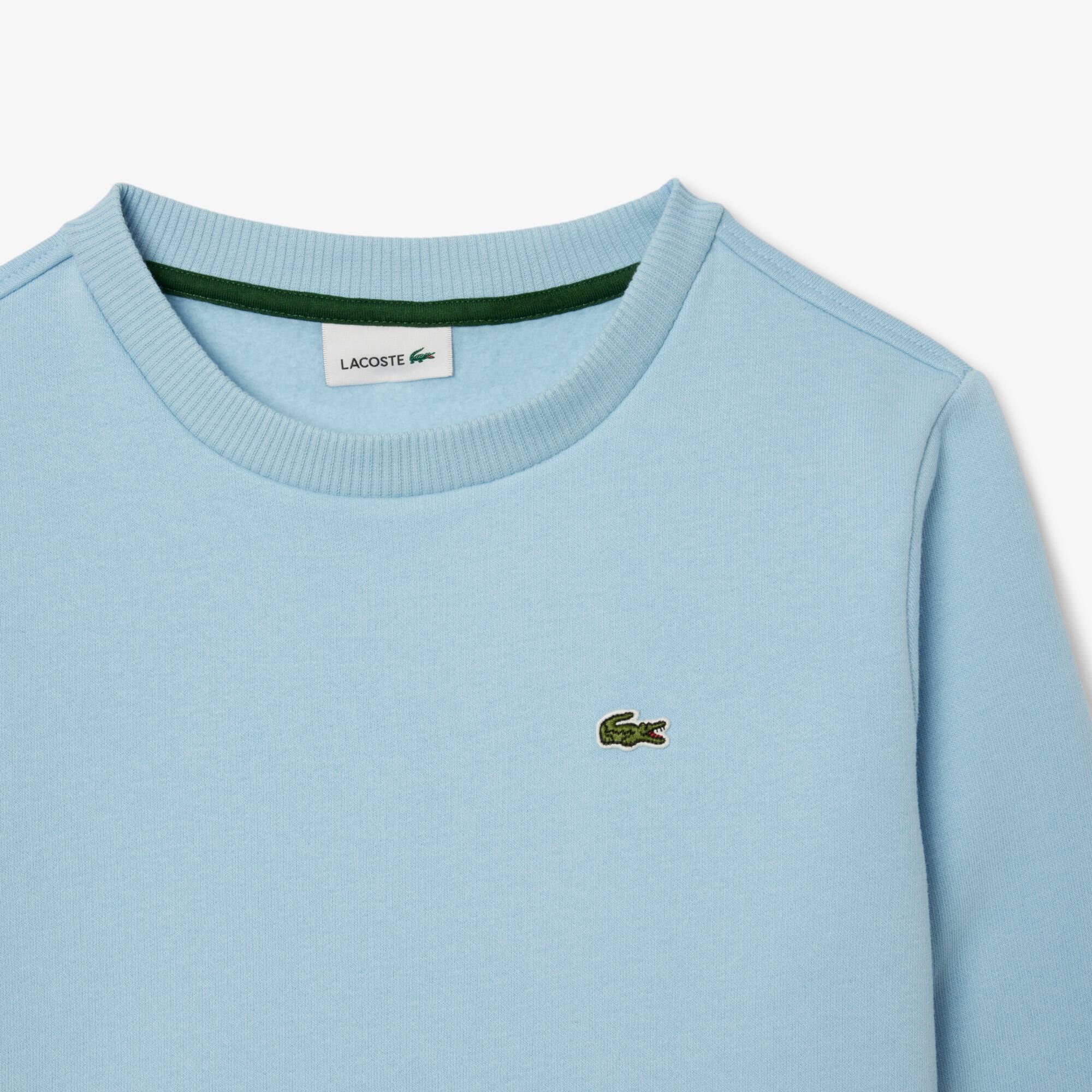 Thumbnail - Lacoste Unisex-Sweatshirt aus Fleece mit Rundhalsausschnitt - Pastellblau Size 9 - 10A
