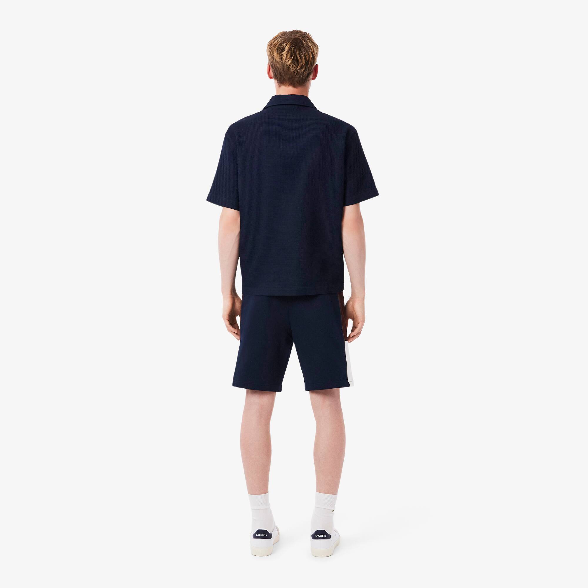 Thumbnail - Lacoste Shorts aus Fleece mit Colorblock-Design - Navy Blau / Weiß / Braun Size XXL