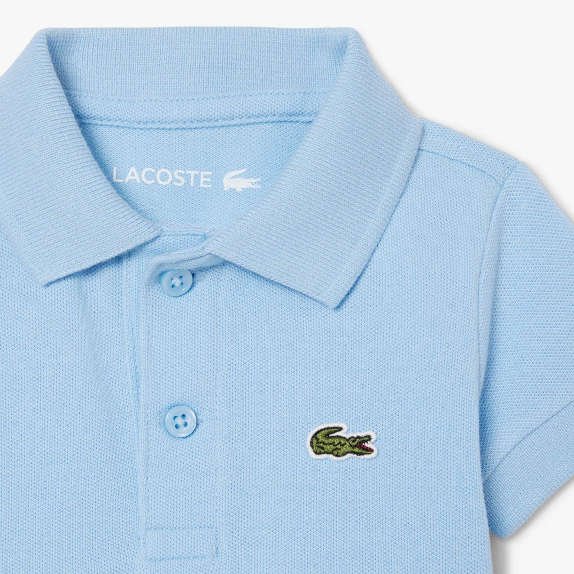 Thumbnail - Lacoste Baby-Body aus Petit Piqué - Pastellblau Size 5 - 12M