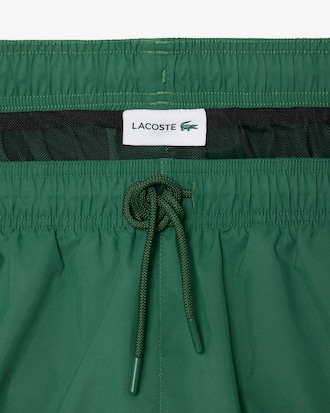 Halblange, einfarbige Badehose
