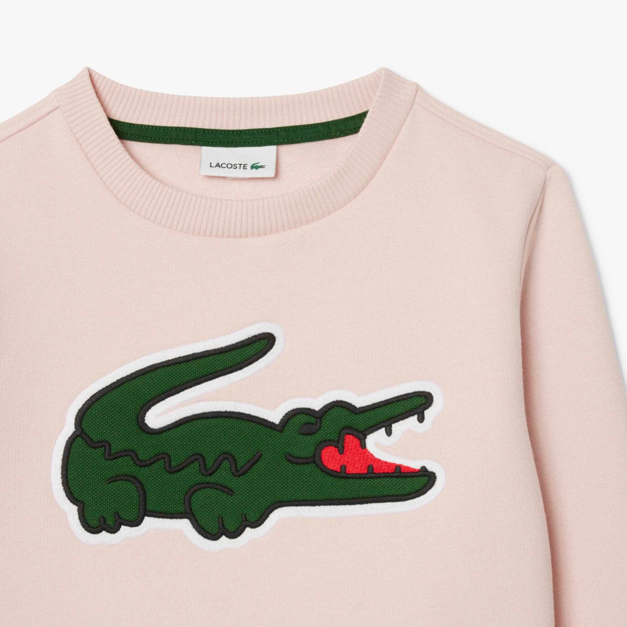 Thumbnail - Lacoste Sweatshirt aus Fleece mit Print - Hellrosa Size 10 - 12A