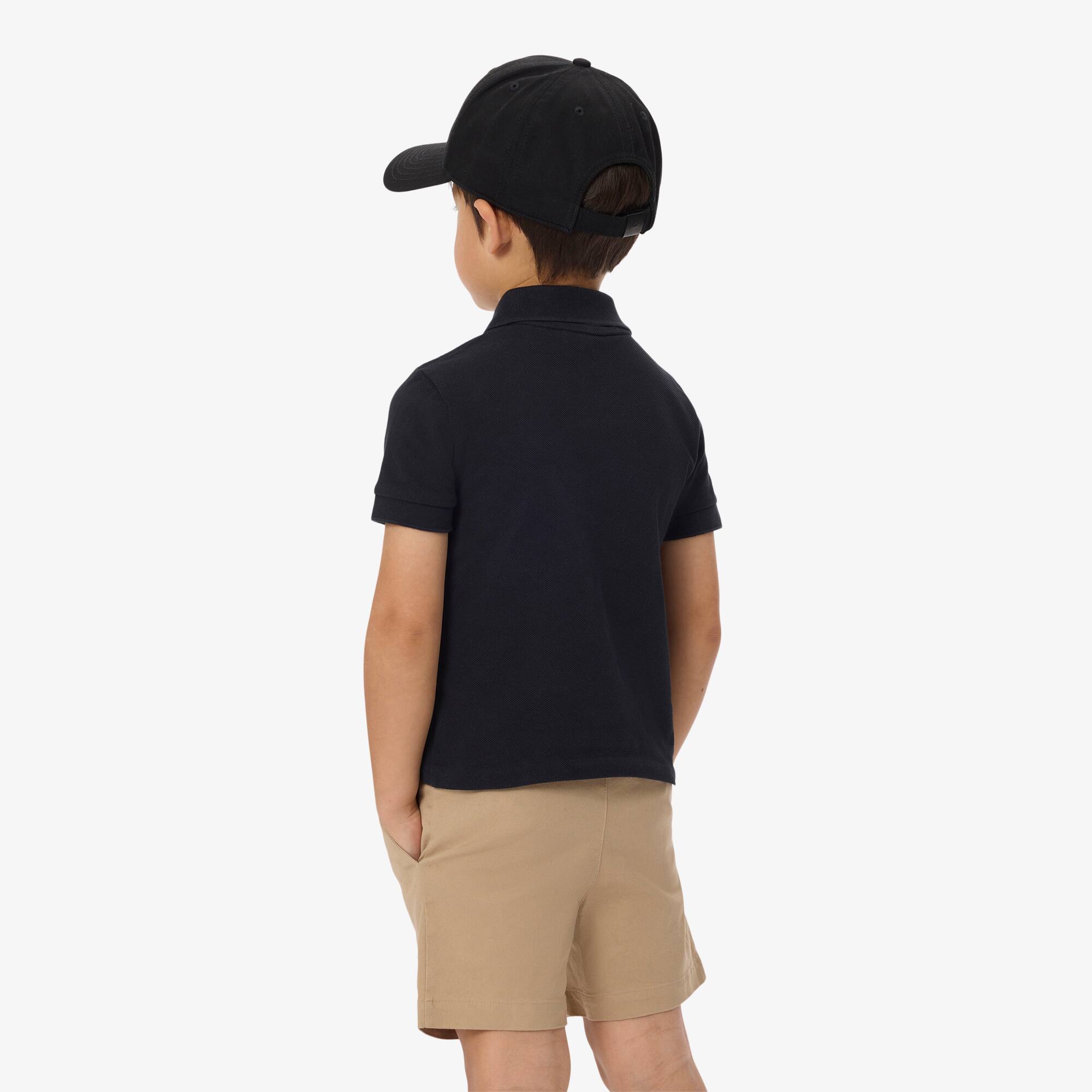 Thumbnail - Lacoste Polohemd aus Petit Piqué mit Colorblock-Design - Schwarz Size 7 - 7A