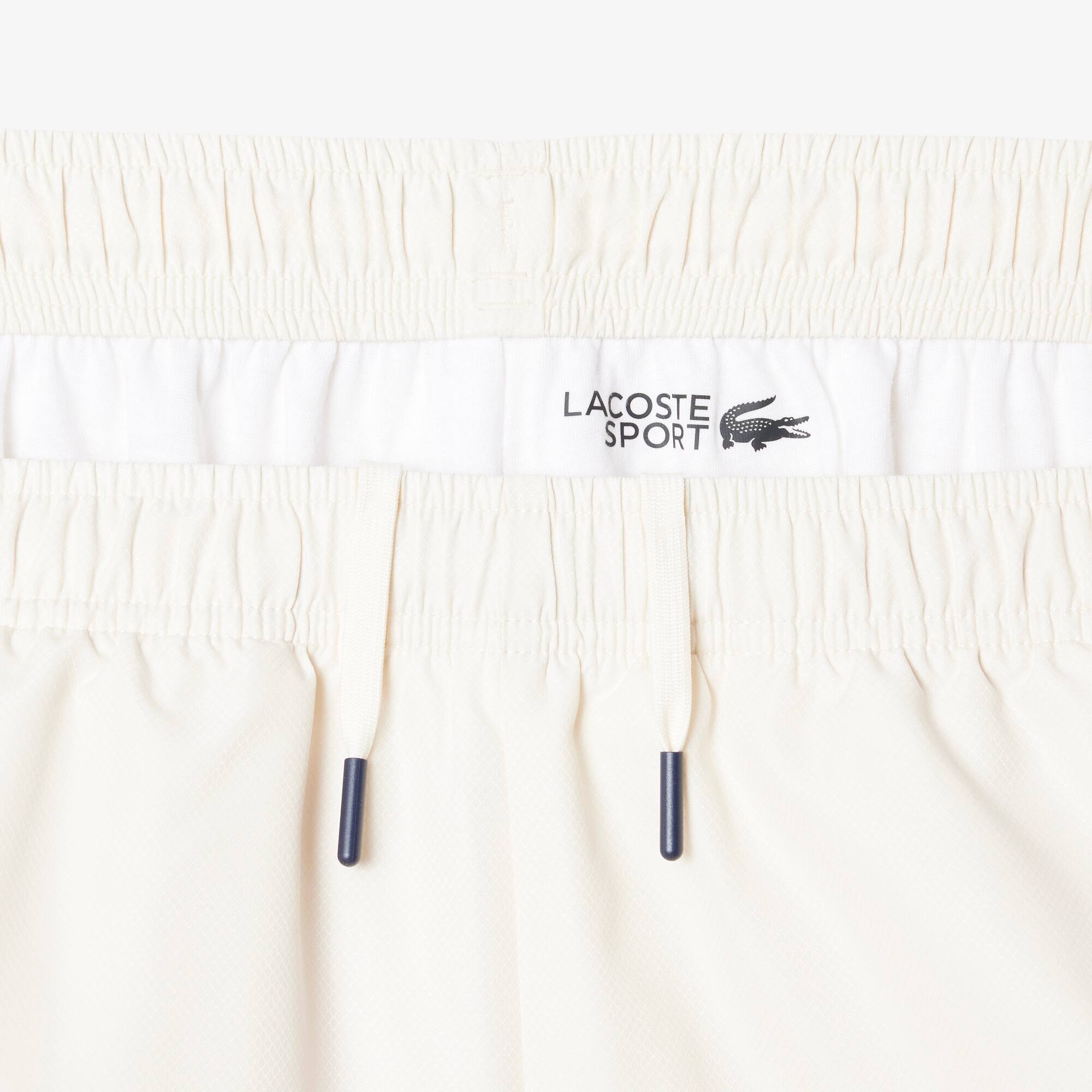 Thumbnail - Lacoste Tennis-Trainingshose mit Print - Creme Size 3XL