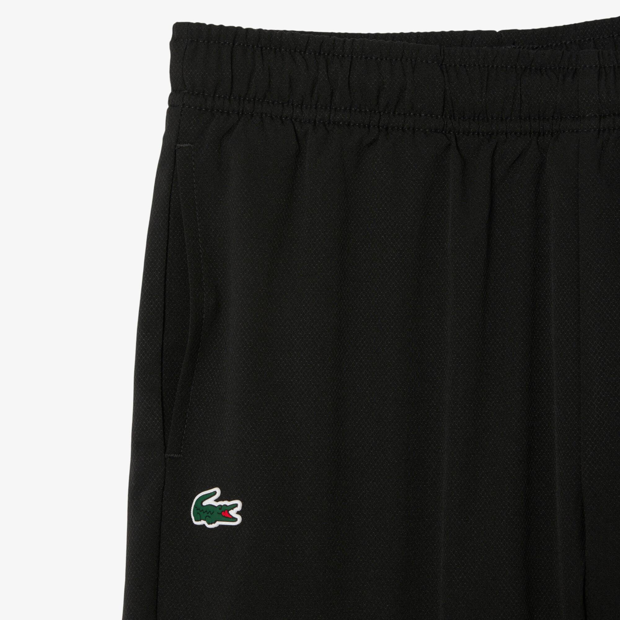 Thumbnail - Lacoste Sportshorts aus Taft mit Print und Ultra Dry-Technologie - Schwarz / Neongelb Size 9 - 10A