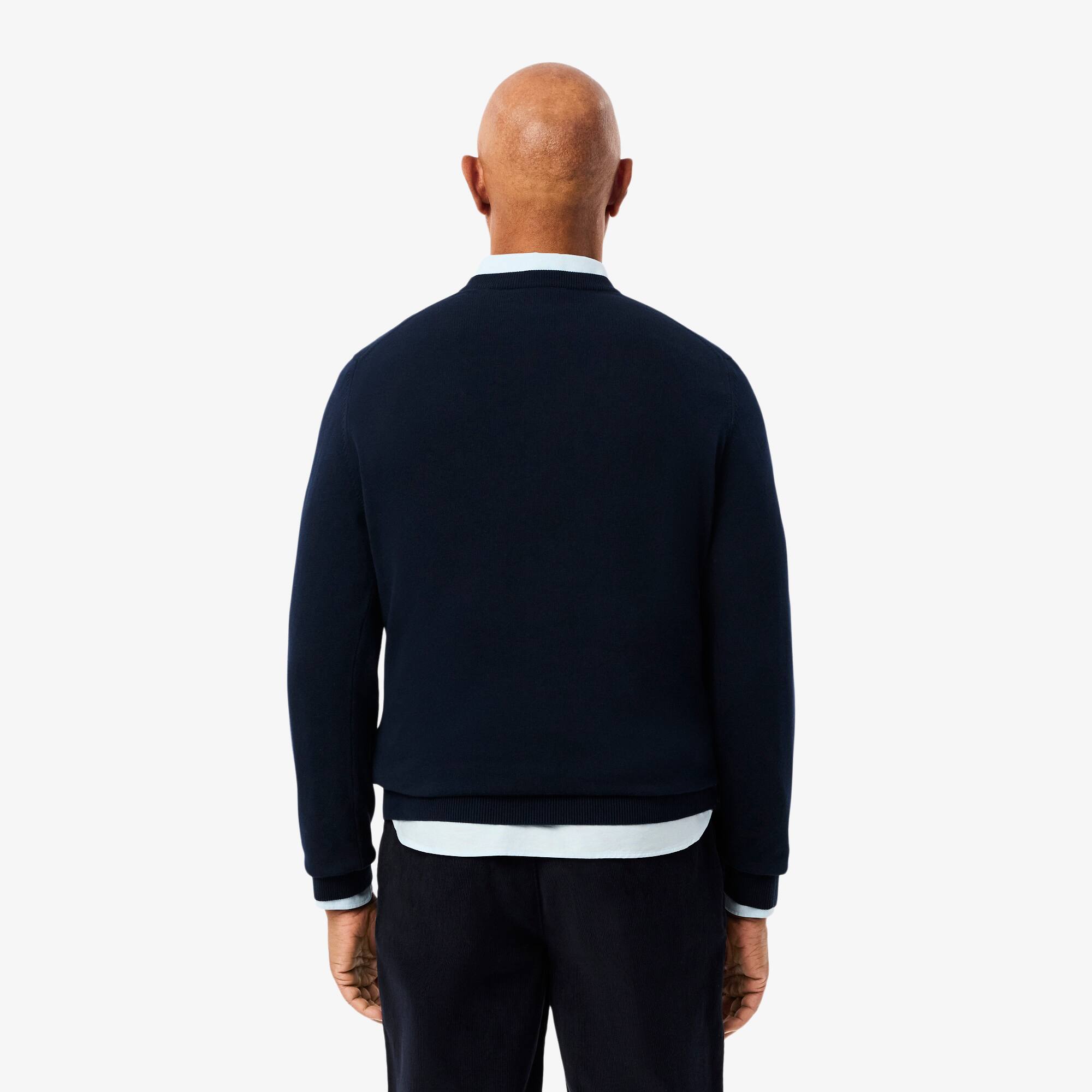Thumbnail - Lacoste Einfarbiger Pullover aus Baumwolle mit V-Ausschnitt - Navy Blau Size M