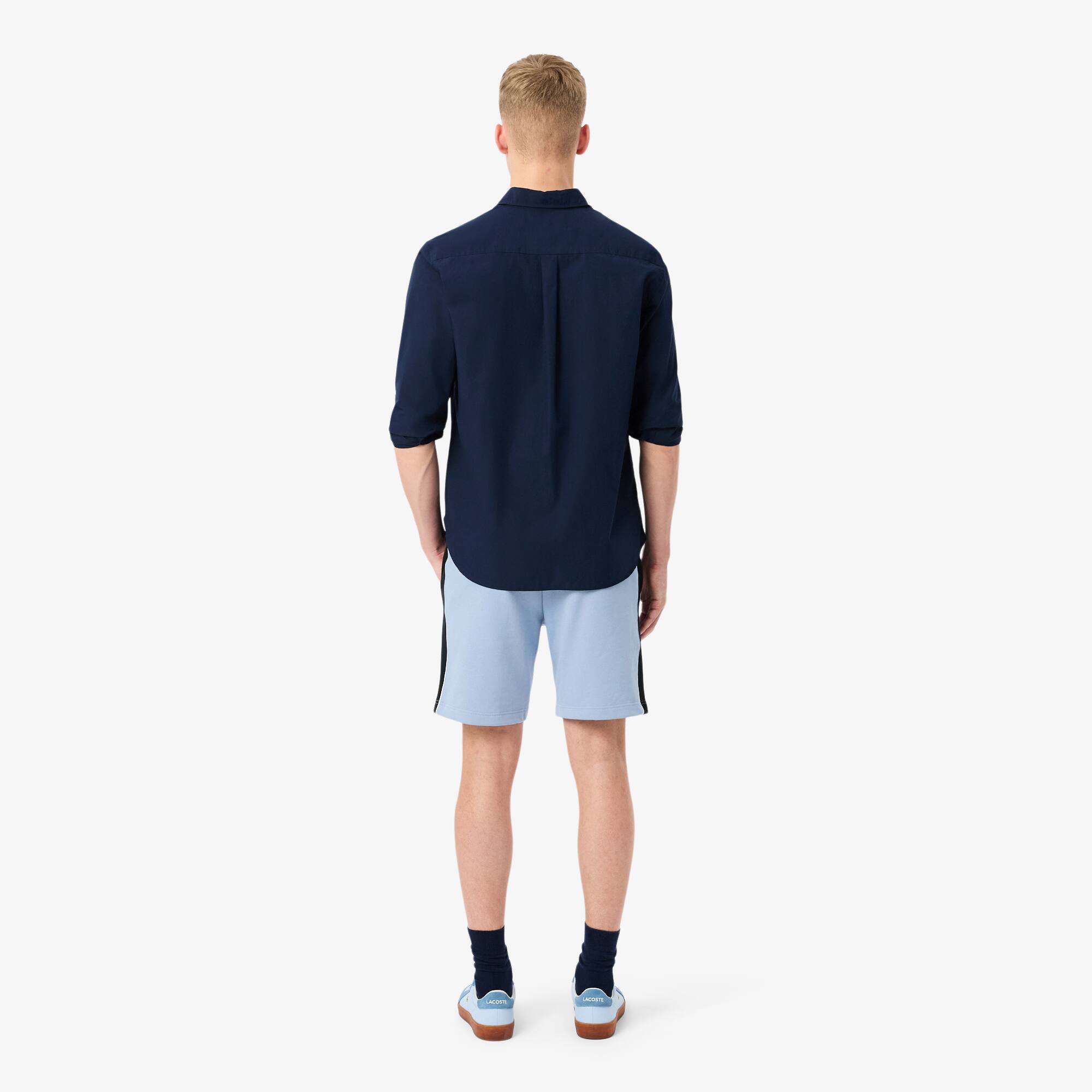 Thumbnail - Lacoste Regular Fit-Shorts aus Fleece mit Colorblock-Design - Bleu Clair / Noir Size L