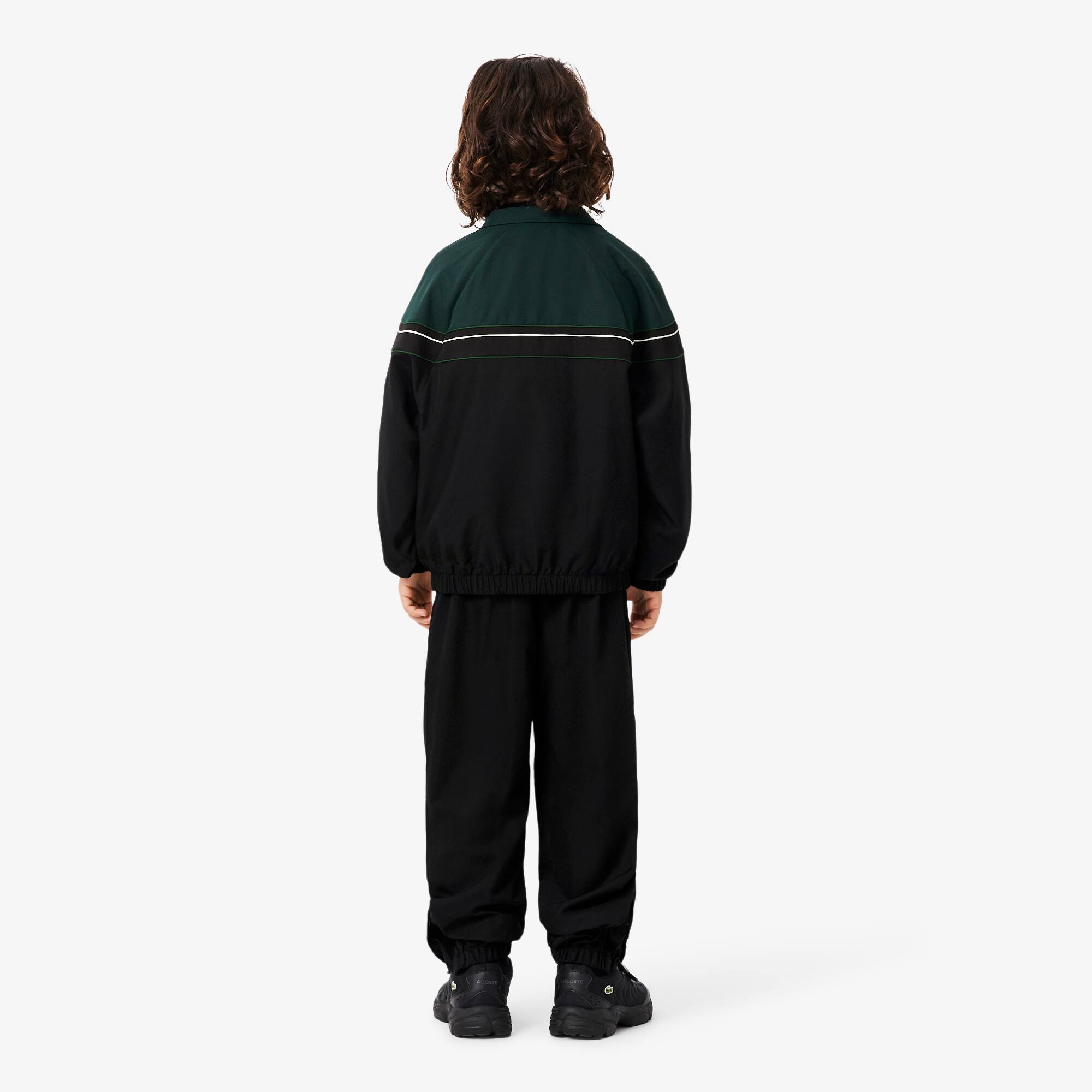 Thumbnail - Lacoste Trainingsanzug aus Diamant-Taft mit Colorblock-Design - Schwarz / Grün / Weiß Size 12 - 16A