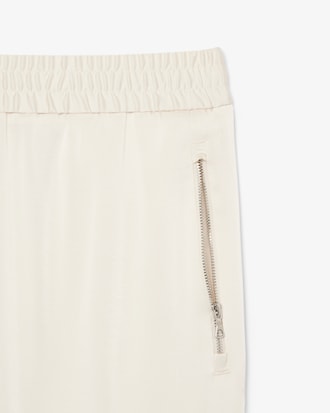 Fließende Hose mit Reißverschlusstaschen