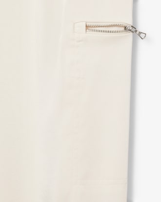 Fließende Hose mit Reißverschlusstaschen