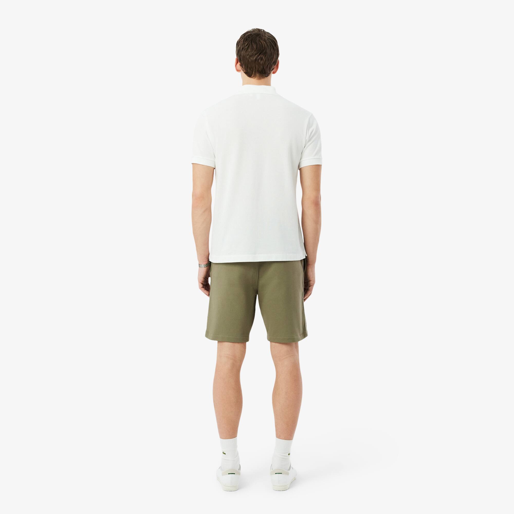 Thumbnail - Lacoste Regular Fit-Shorts aus Fleece mit Logostreifen - Khaki Grün Size S