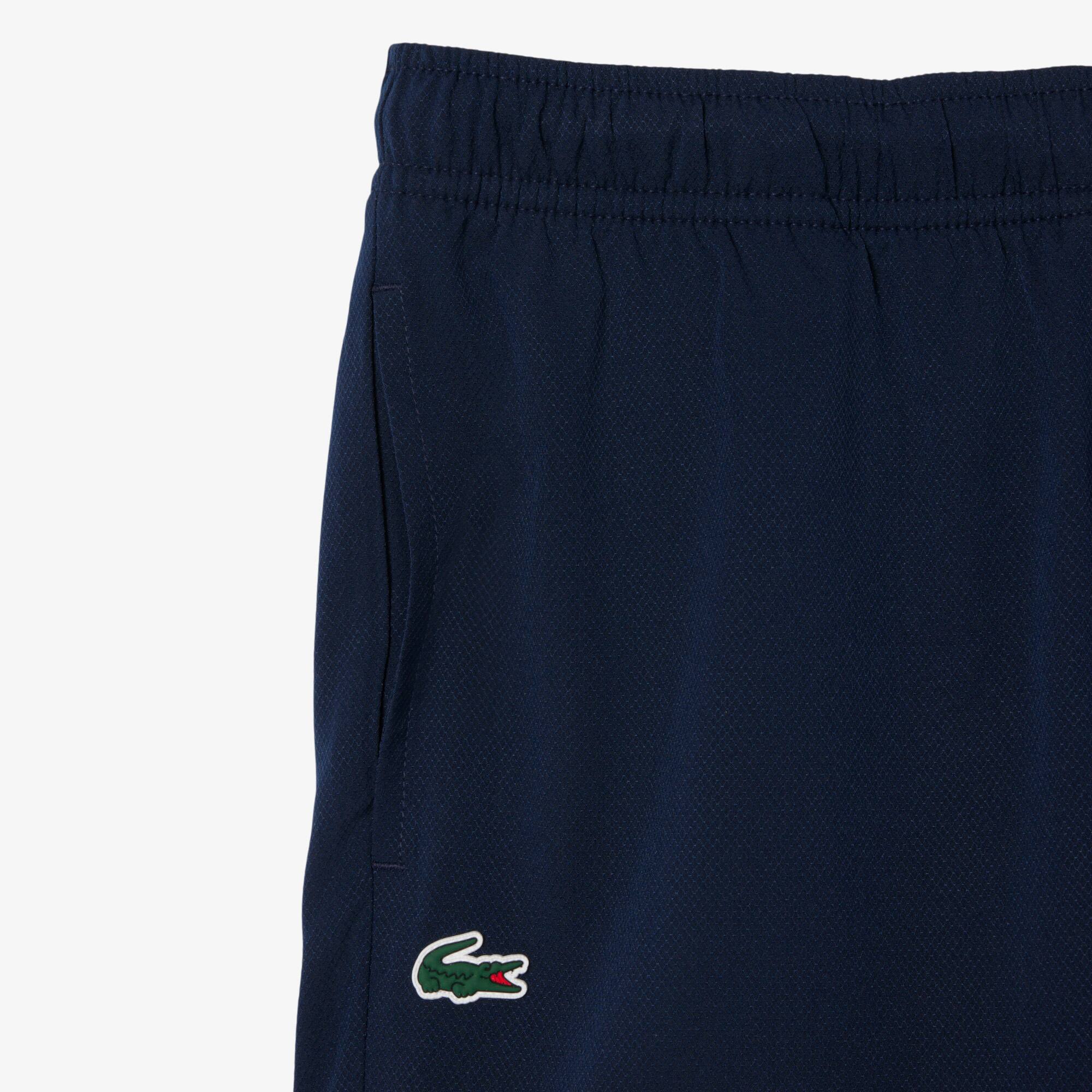 Thumbnail - Lacoste Sportshorts aus Taft mit Print und Ultra Dry-Technologie - Navy Blau / Weiß Size 10 - 12A