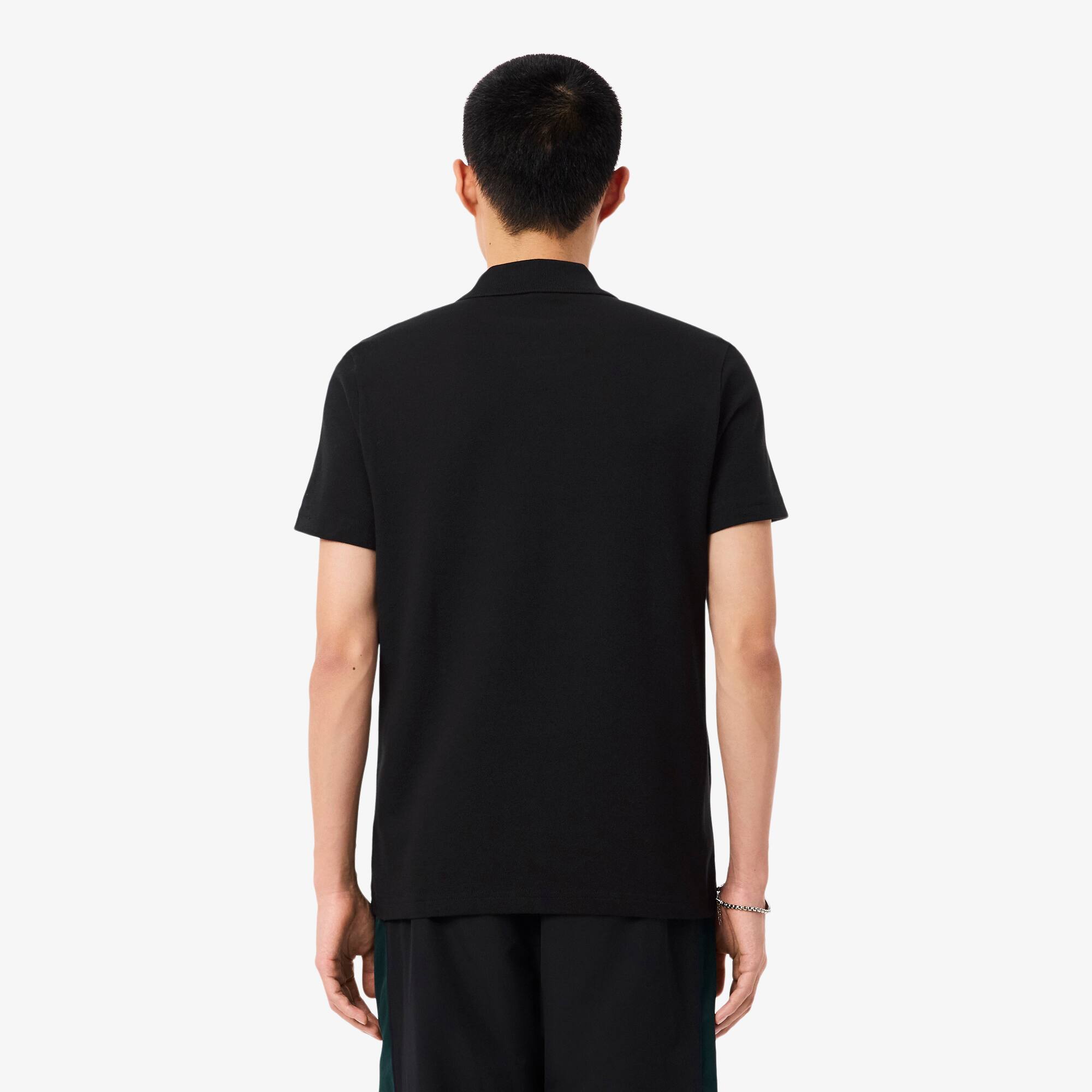 Thumbnail - Lacoste Regular Fit-Polohemd aus Mini-Piqué mit Colorblock - Schwarz / Weiß / Grün Size L