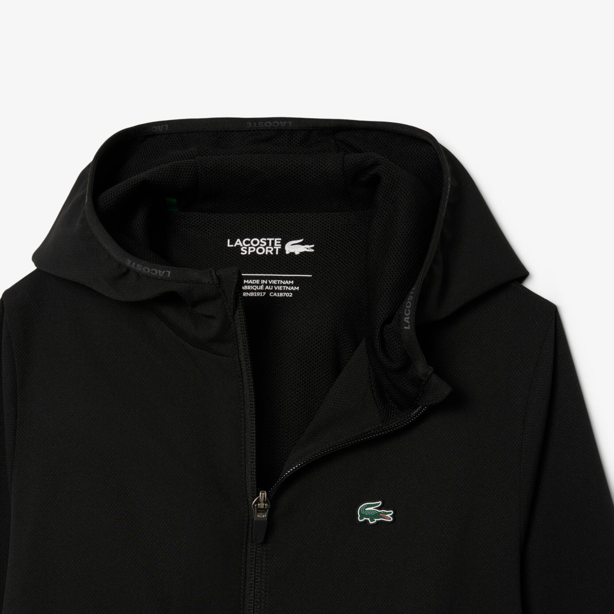 Thumbnail - Lacoste Wasserabweisende Sport-Puffer-Jacke mit Ultra Dry-Technologie - Schwarz Size 12 - 16A