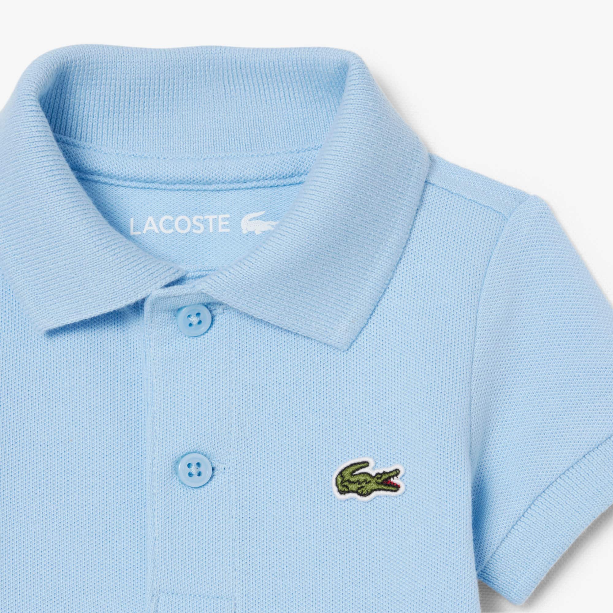 Thumbnail - Lacoste Baby-Body aus Petit Piqué - Pastellblau Size 2 - 3M