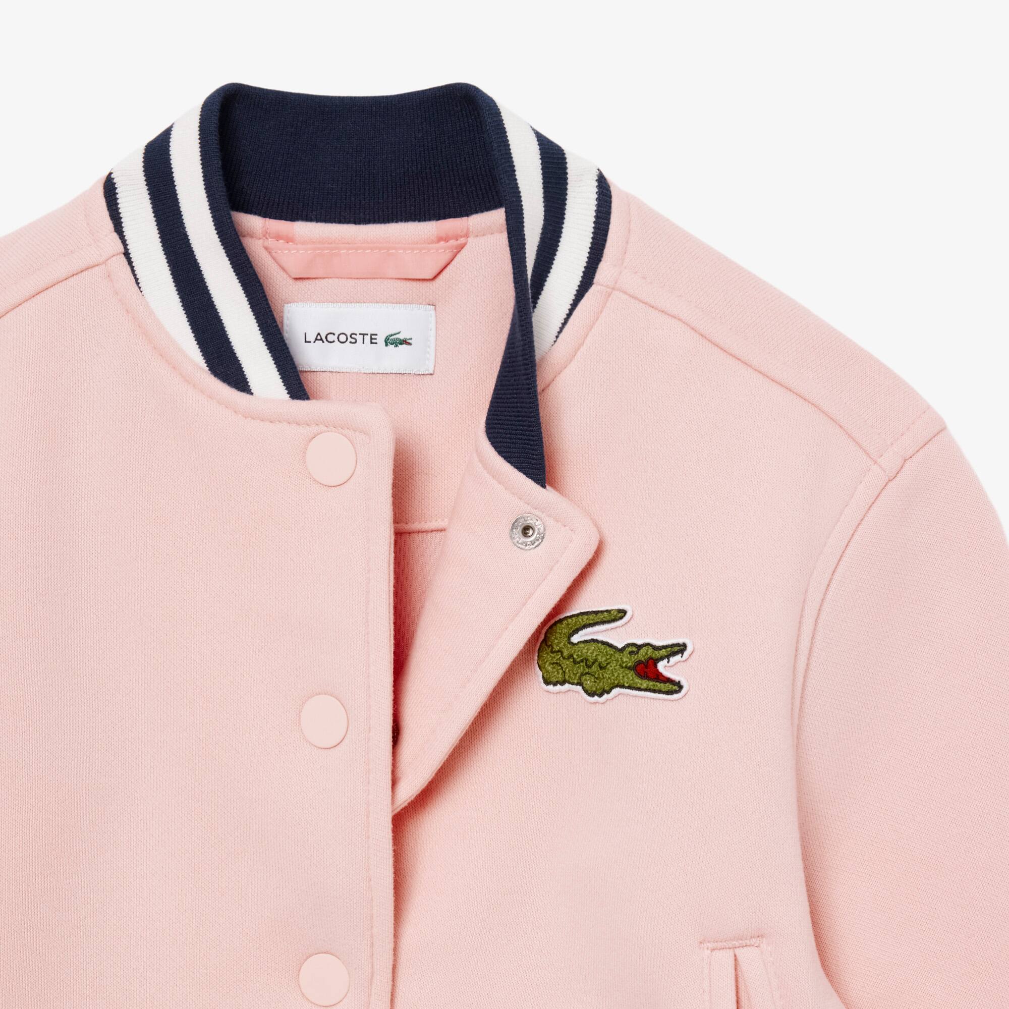 Thumbnail - Lacoste Bomberjacke aus Fleece mit gesticktem Badge - Hellrosa Size 4 - 4A