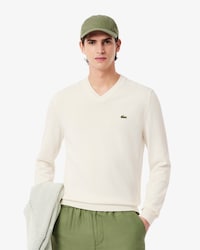 Einfarbiger Pullover aus Baumwolle mit V-Ausschnitt
