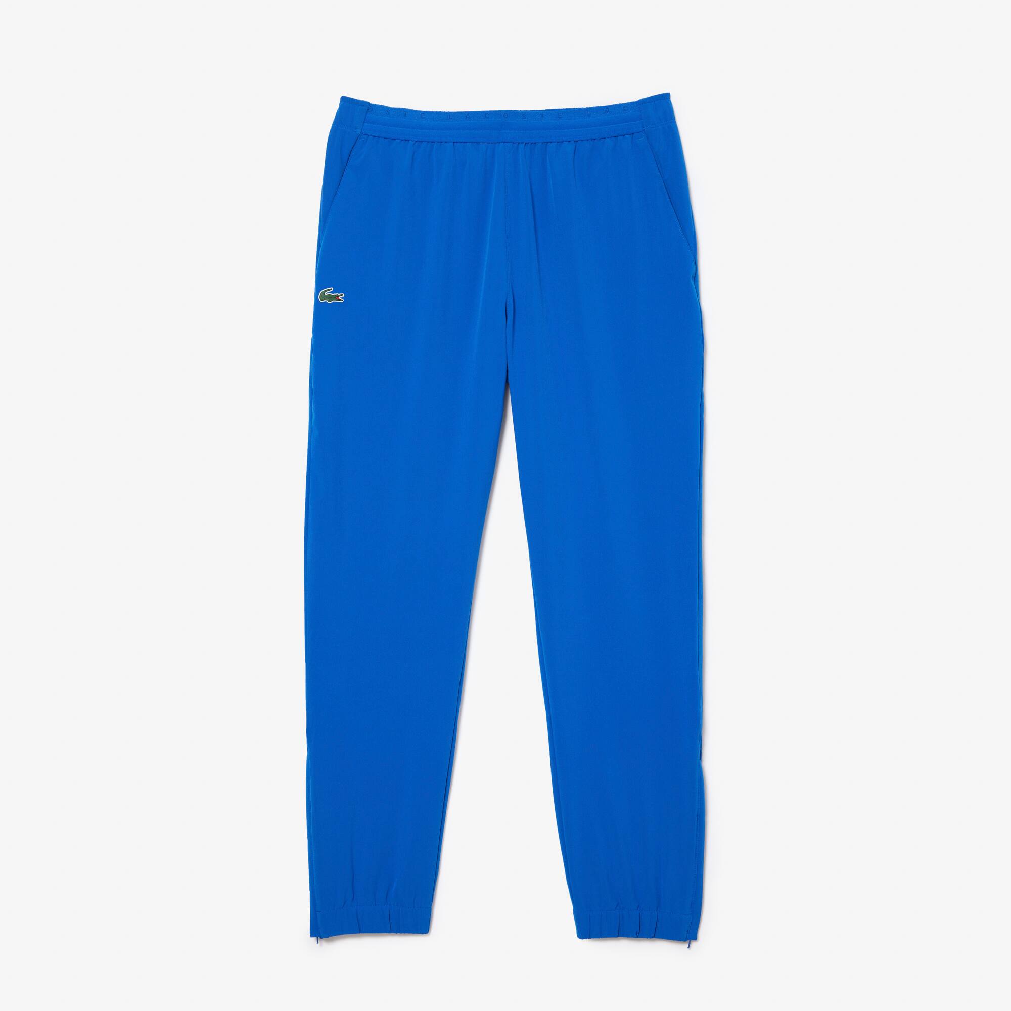 Blue lacoste track 2025 pants