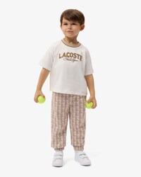 Pantal&oacute;n de ch&aacute;ndal con monograma
