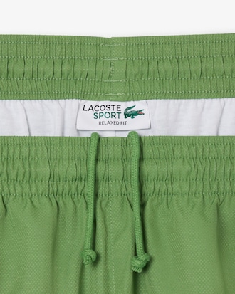 Pantal&oacute;n corto de tenis ligero de rayas con bloques de color